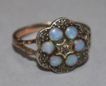 A late 19th century gold, white opal and diamond shaped hexagonal cluster ring, (possibly