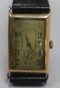 An Art Deco gentleman's 9ct gold wristwatch with silvered Arabic dial