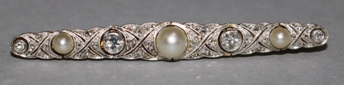 A split pearl and diamond bar brooch, white and yellow metal settings (tests as 18ct white gold