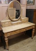 A bleached mahogany dressing table, W.122cm