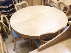 A bleached mahogany breakfast table and 6 chairs, W.132cm