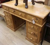 A pine pedestal desk, W.122cm