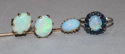 A white metal, white opal and sapphire cluster ring, a pair of yellow metal and white opal