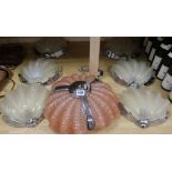 An Art Deco glass shell central light fitting and a set of six similar wall lights