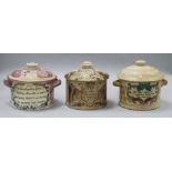 A Sunderland pink lustre jar and cover and two other jars and covers