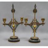 A pair of 19th century French ormolu and champleve candelabra