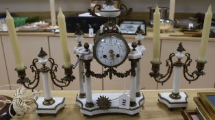 A Louis XVI white marble clock set