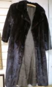 A dark brown mink coat