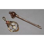 An early 20th century 9ct gold and jasper set sword brooch and a 14ct gold, white opal and ruby