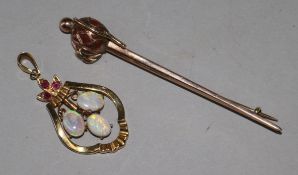 An early 20th century 9ct gold and jasper set sword brooch and a 14ct gold, white opal and ruby