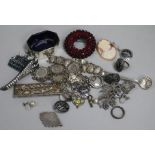 Mixed jewellery and silver, including locket, brooches and bracelet.