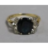 An 18ct gold, sapphire and diamond dress ring, size J.