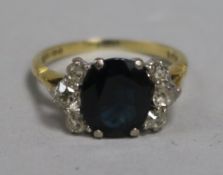 An 18ct gold, sapphire and diamond dress ring, size J.