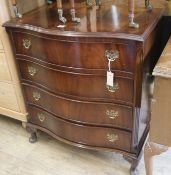 A mahogany serpentine chest of drawers, W.76cm