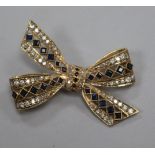 A 9ct yellow gold, sapphire and diamond bow brooch, 40mm.