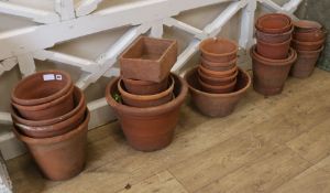 A quantity of terracotta pots, various sizes