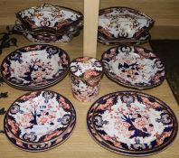 A collection of Derby Imari patterned dinner ware