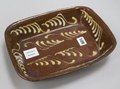 A small 18th century Sussex slipware dish