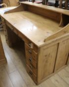 A large pine desk, W.167cm