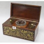 A Regency rosewood and cut brass tea caddy