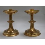 A pair of brass candlesticks