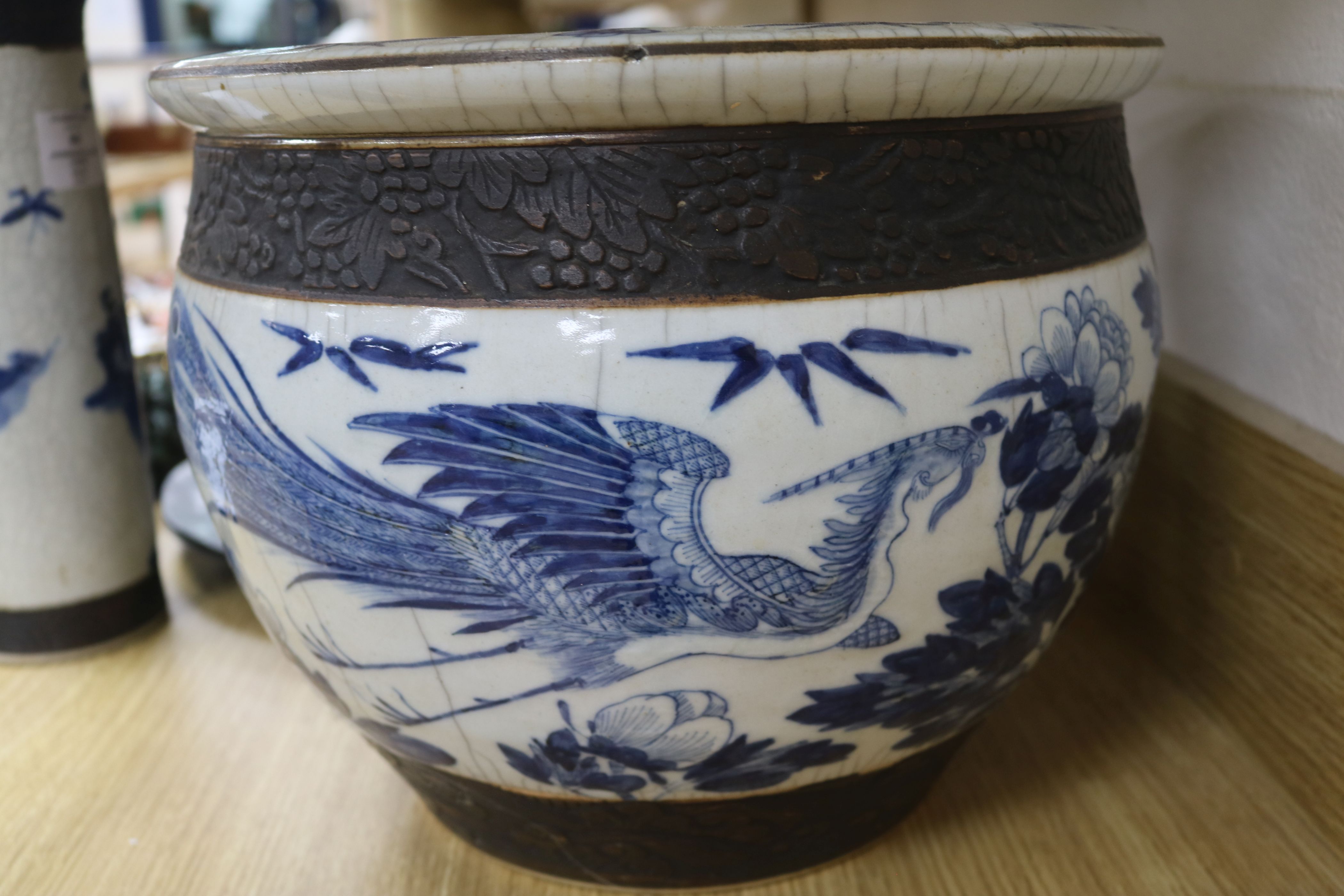 A Chinese blue and white crackleglaze jardiniere and two vases - Image 12 of 13