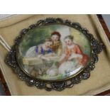 A Victorian miniature of three young girls with rabbits, in a polished steel frame, 7cm.