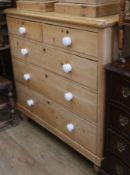 A pine chest of five drawers, W.108cm