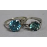 A 14ct gold and blue zircon ring and one other white gold and zircon ring.