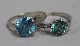 A 14ct gold and blue zircon ring and one other white gold and zircon ring.