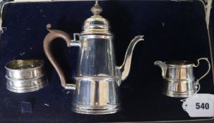 A cased silver three piece batchelor's coffee set, Adie Brothers, Birmingham, 1925, gross 12 oz.