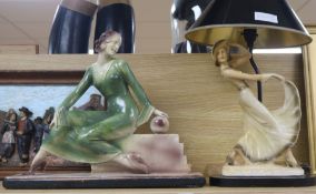 An Art Deco figural lady lamp and a similar centrepiece