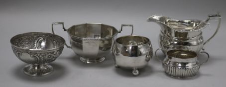 A Victorian silver sugar bowl, Edward Hutton, London, 1883, three other sugar bowls and a cream