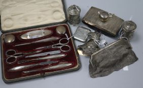 A pair of ornate white metal peppers, a silver vesta case and sundry items, including a silver-