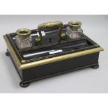 A Gillows brass mounted ebonised inkstand