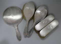 A 1930's engine turned silver five piece mirror and brush set, Barker Brothers Silver Ltd,