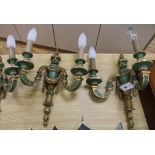 A set of three green and gilt painted twin branch wall lights, in late 18th century style