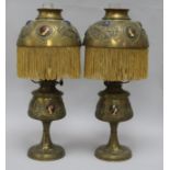 A pair of French decorative oil lamps