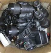 A group of binoculars / cameras