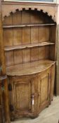 A small oak dresser with rack, W.108cm