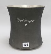 A Dom Perignon ice bucket designed by Martin Szekely