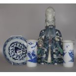 A Buddha, two vases and a plate