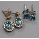 A pair of 9ct gold, blue zircon and diamond cluster earrings and a pair of white metal single