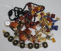 A 9ct gold wristwatch, two yellow metal chains, a jet necklace and a quantity of miscellaneous