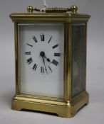 A French brass carriage clock with leather case