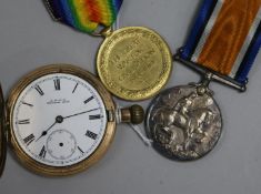 A gold plated pocket watch and pair of 1st WW medals.