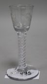 A wine glass, c.1770, with bucket bowl etched with floral sprigs, multi series opaque twist stem,