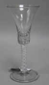 A tall wine glass with bell bowl, over a double series opaque twist stem, 8.5in.