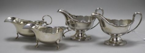 A pair of George V Asprey & Co silver sauceboats and one other pair of silver sauceboats, 16.5 oz.