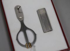 A cased Cartier lighter and cigar cutter, with paperwork